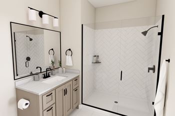 A bathroom with a white sink and a white tiled shower.